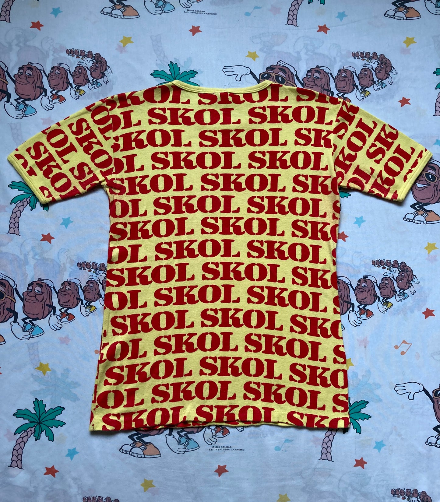 Vintage 70’s Skol Vodka Novelty Print Ringer T shirt size Small All Over Print